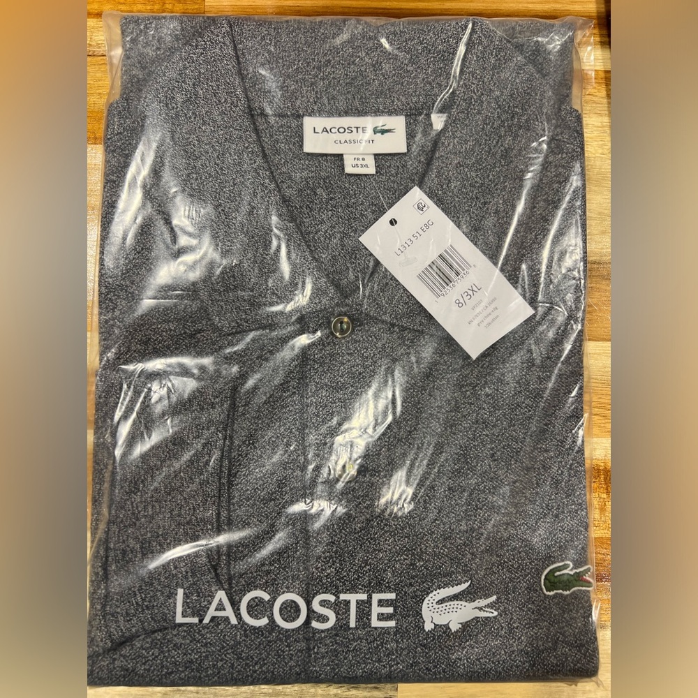 Still in clear bag. Men’s short sleeve Lacoste polo. Size 8 (3XL)